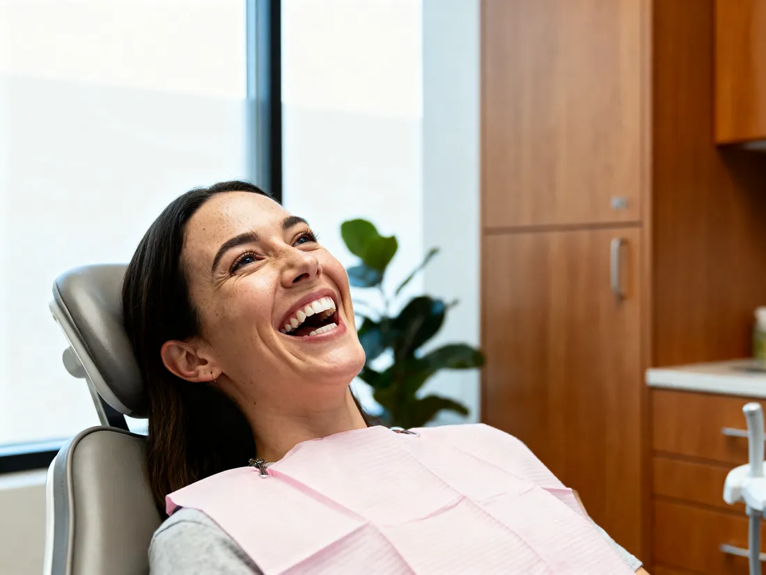 A patient laughing in the treatment chair at Wren Dental Studio
